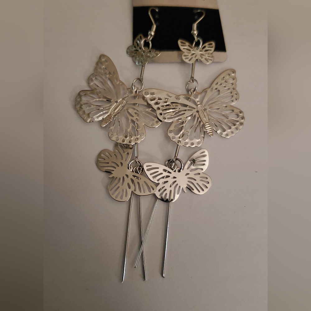 Silver butterfly dangling earrings